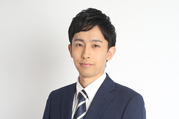 写真　成田甚　コーポレート本部長